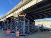 Temporary shoring towers support the bridge girders in an elevated state so bearing assemblies can be replaced and concrete repairs can be performed.   (Shirley-Branch Joint Venture team photo)